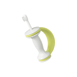 Combi Teteo Step 2 toothbrush fitted inside the green training cover with a large loop handle.
