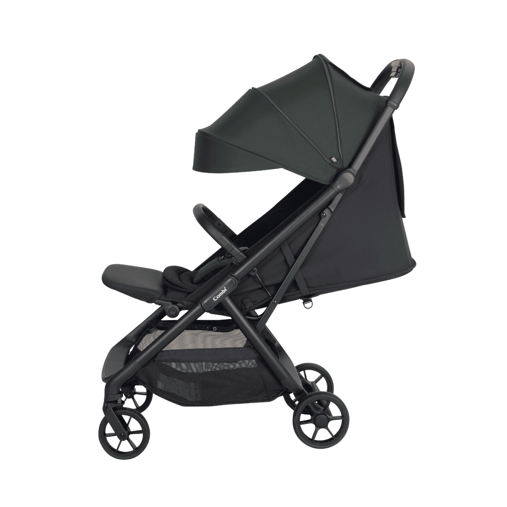Combi Auto N neo stroller in dark green with the canopy extended.