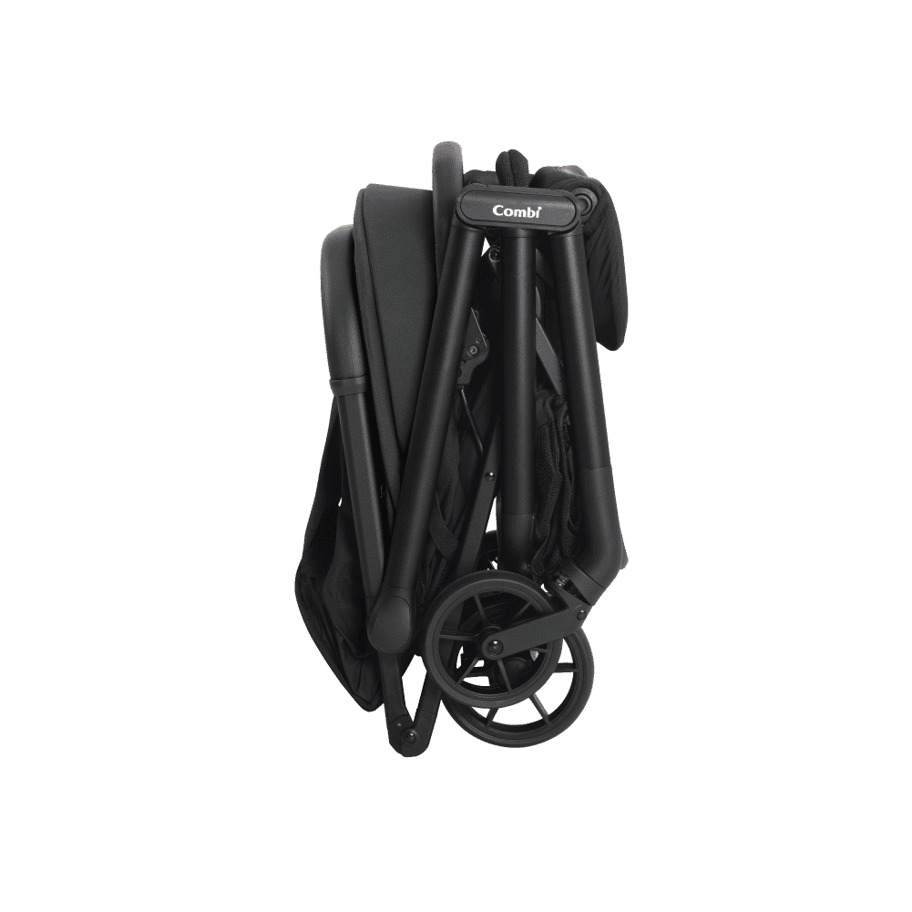 Combi Auto N neo stroller in dark green, folded upright.